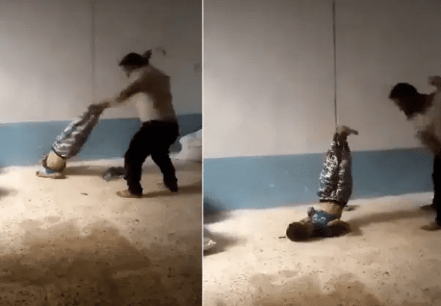 أب عراقي يُعذب ابنه !